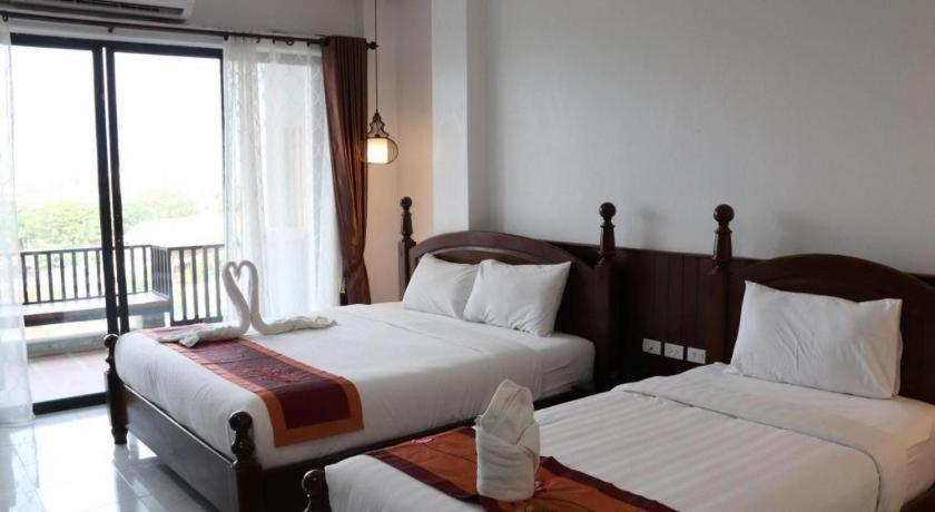 Thavisouk Riverside Hotel Vang Vieng Bagian luar foto