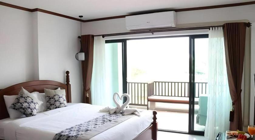Thavisouk Riverside Hotel Vang Vieng Bagian luar foto