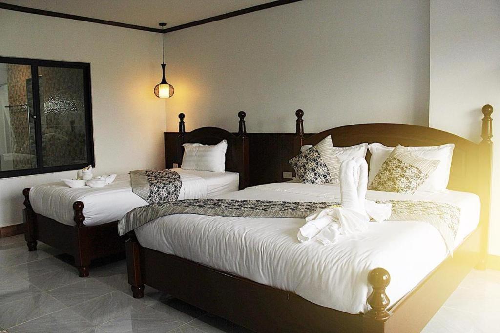 Thavisouk Riverside Hotel Vang Vieng Bagian luar foto