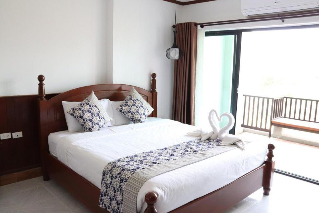 Thavisouk Riverside Hotel Vang Vieng Bagian luar foto
