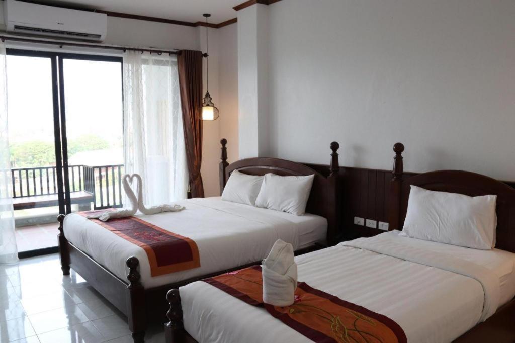 Thavisouk Riverside Hotel Vang Vieng Bagian luar foto