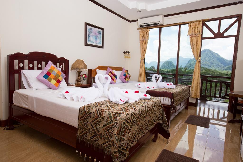 Thavisouk Riverside Hotel Vang Vieng Bagian luar foto